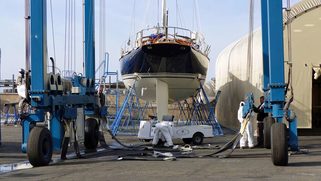 Preparation of straps for launching sailboat at Santa Barbara Harbor